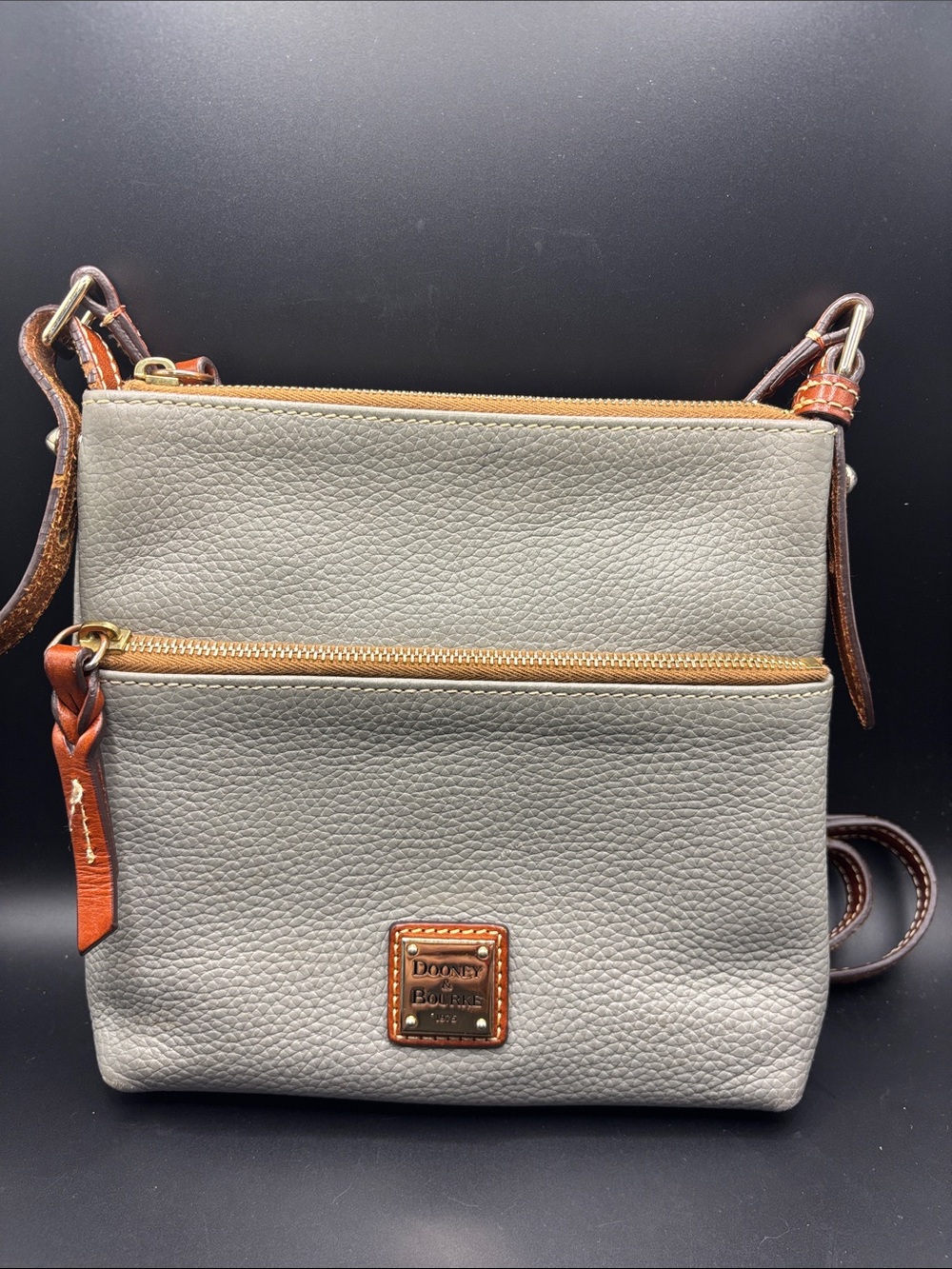 Dooney & Bourke Gray Pebbled Leather Crossbody with Brown Trim and Brass Accents